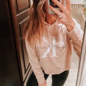 Calvin Klein Jeans peach hooded cropped sweatshirt